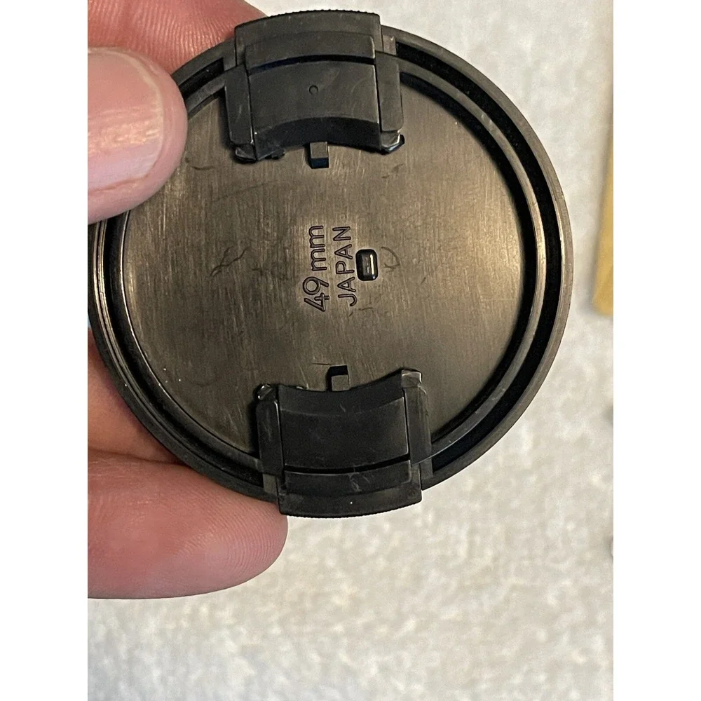 Albinar-ADG 49 mm Rigid Plastic Tab Lock Front Lens Cap Made in Japan.
